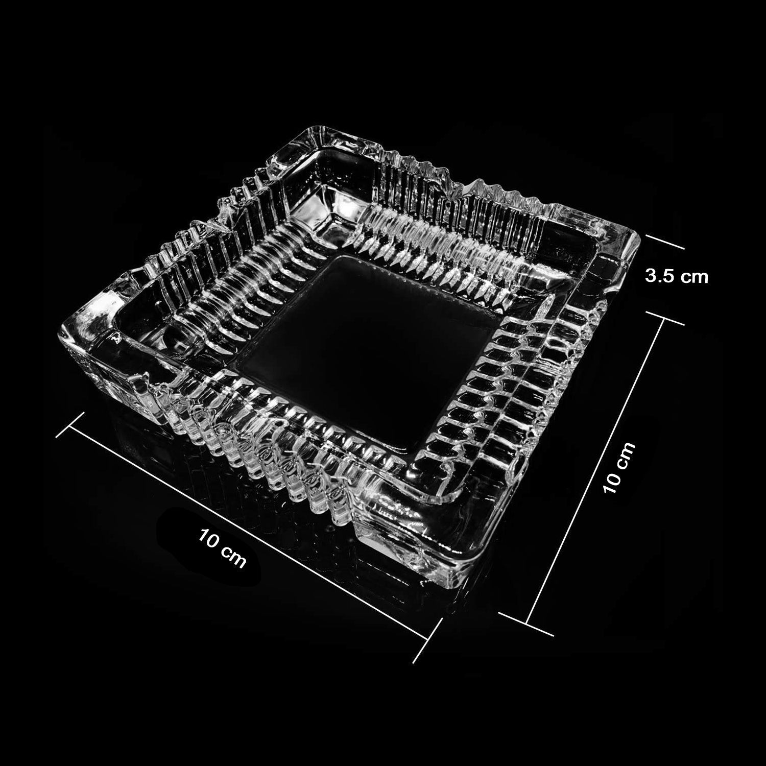 Glass ashtray with square design.