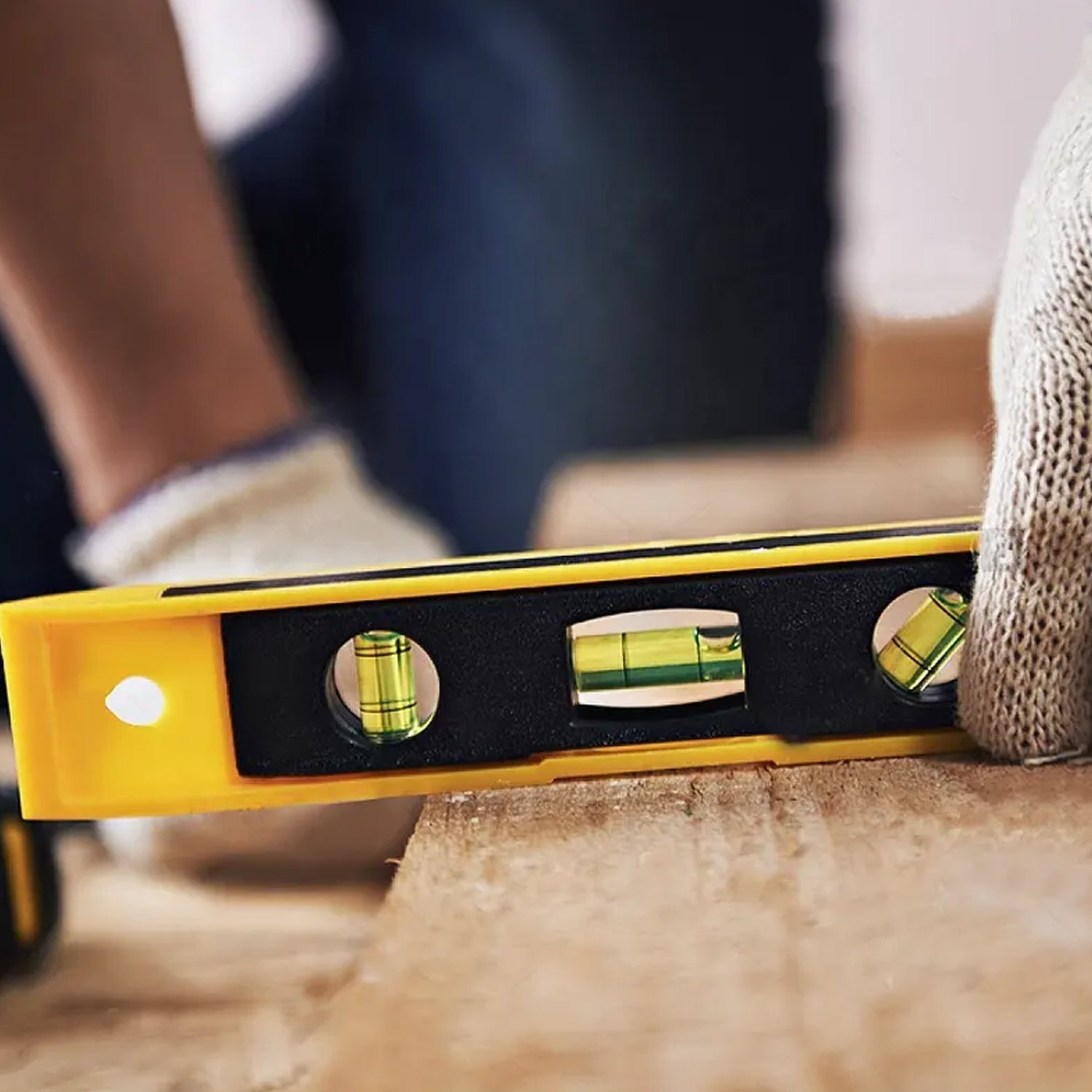 Multi-bubble mini spirit level for carpenters and DIY projects.