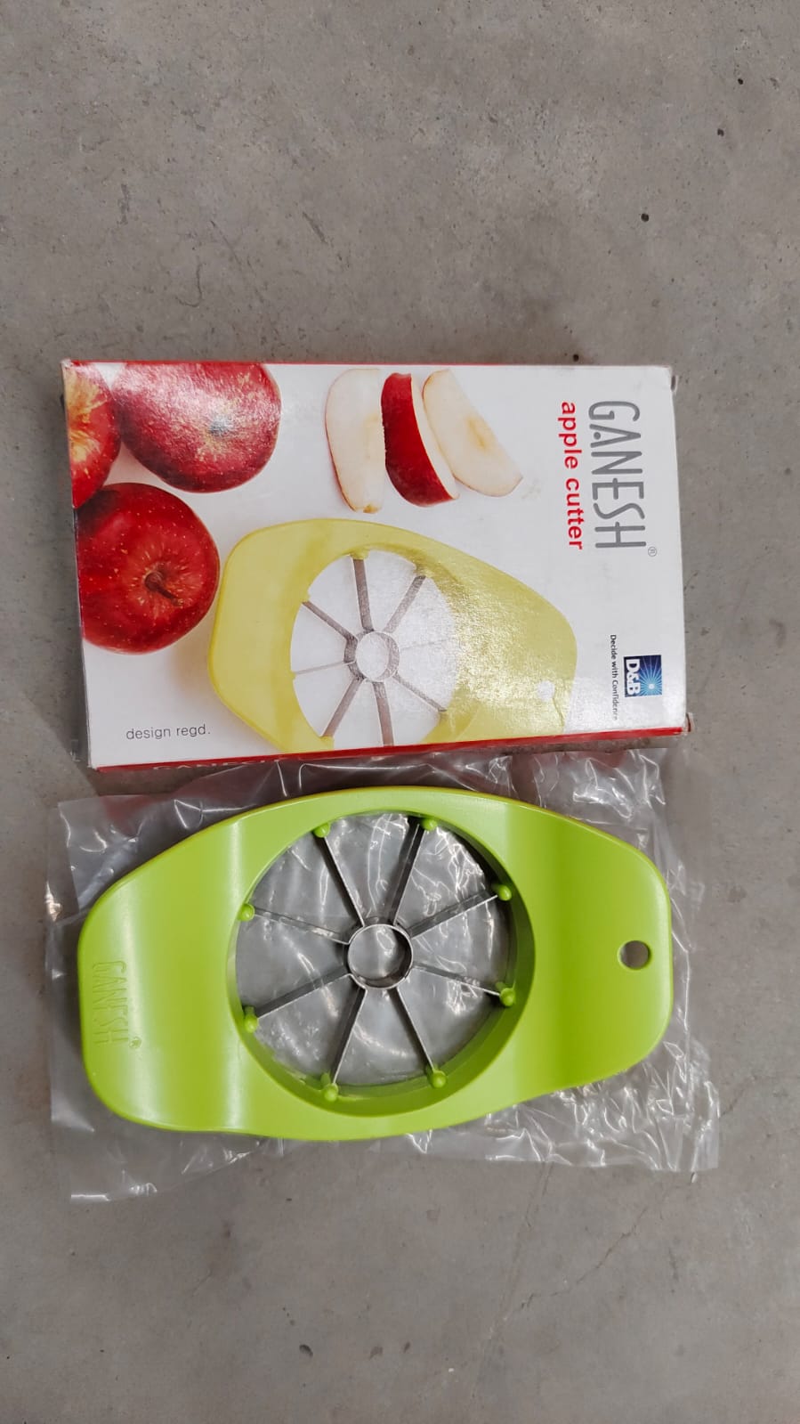 Ganesh apple cutter, stainless steel and plastic, color options available.