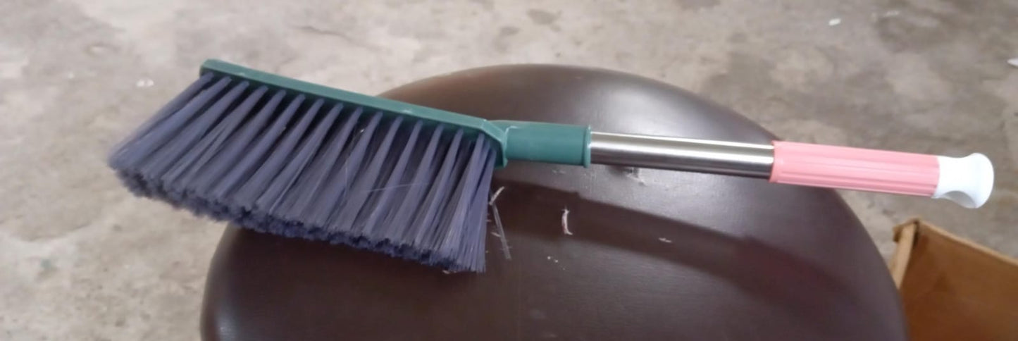 Brush for cleaning car seats and upholstery