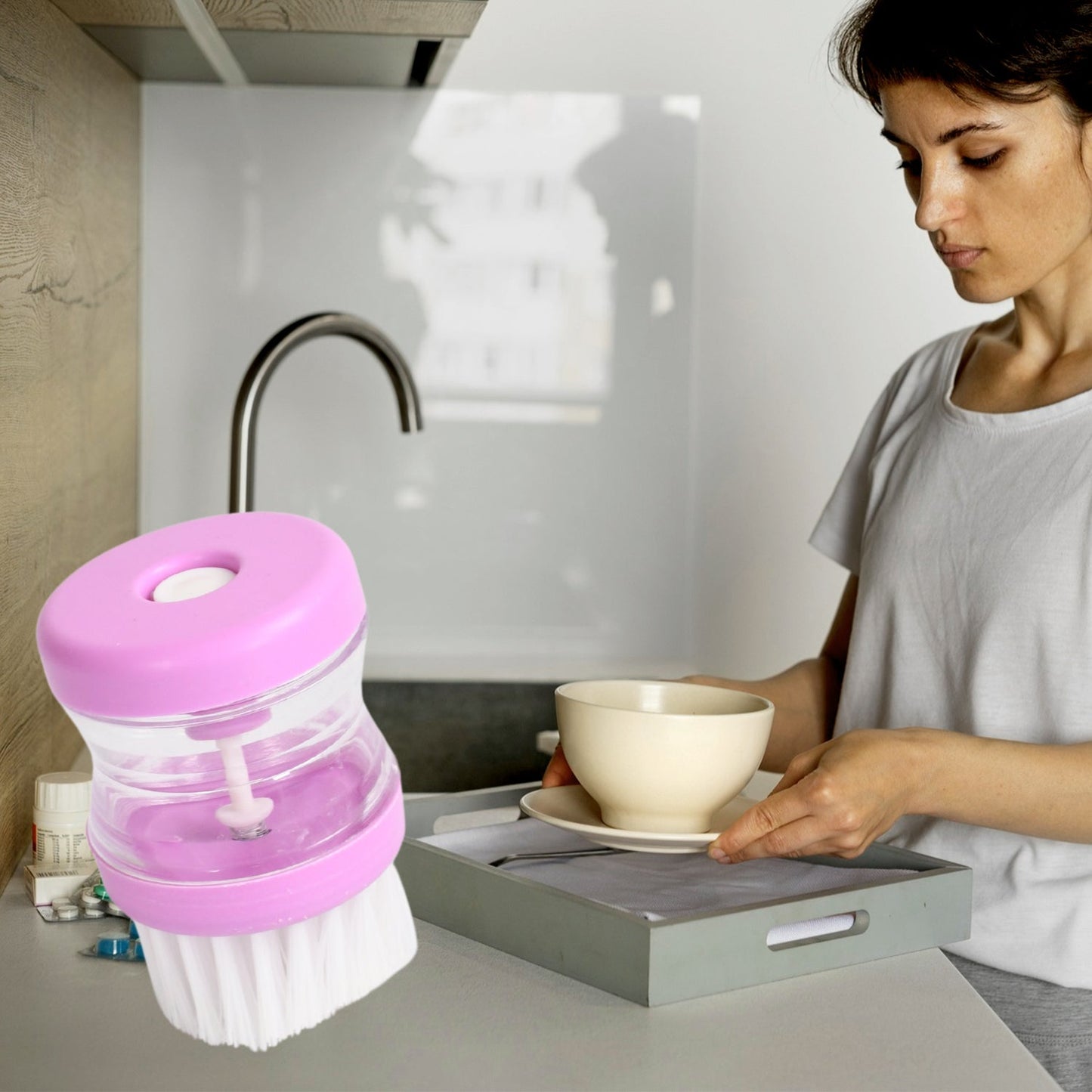 Multicolour wash basin brush with liquid soap dispenser.